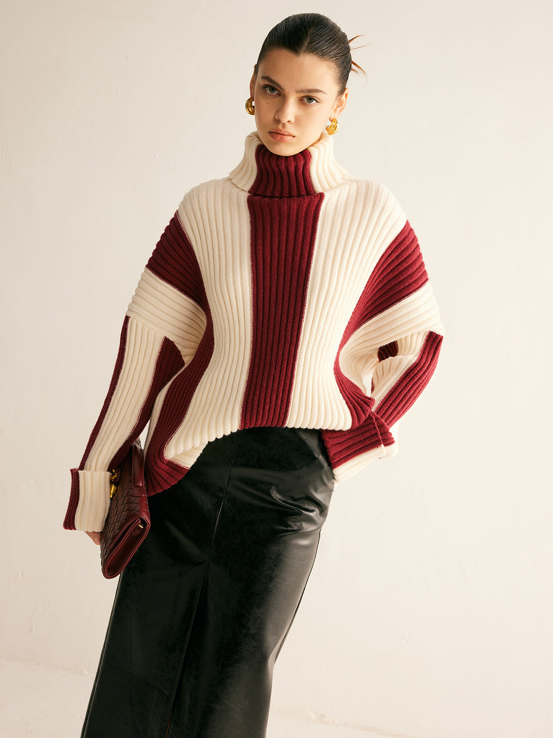 Nikki Color Block Sweater featuring a stylish ribbed turtleneck and made from soft knit fabric, perfect for cozy fall outfits. - 1