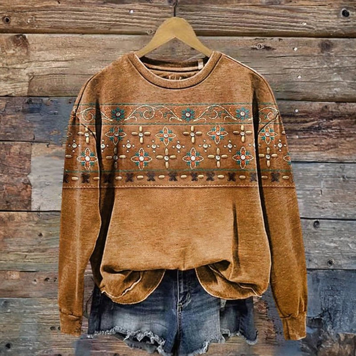 Mara Sweatshirt featuring a vibrant floral print, perfect for a cozy and stylish look. - 1