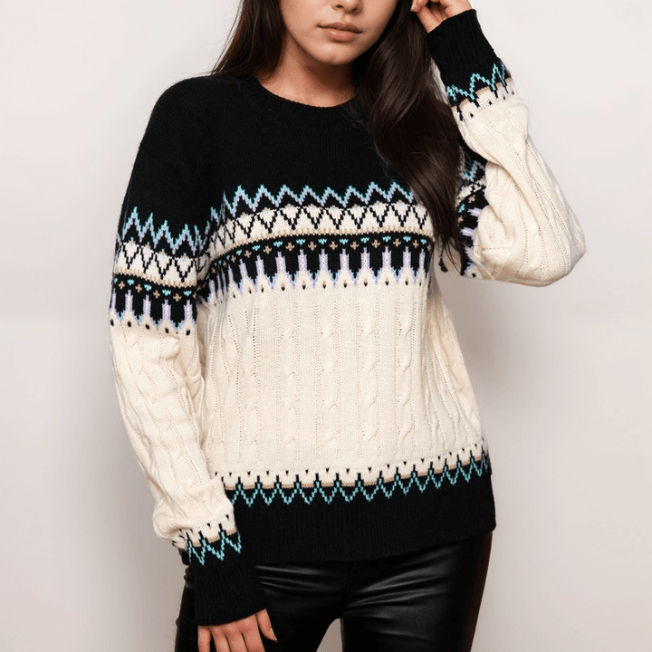 Nora Knit Sweater featuring a cozy Fair Isle pattern and intricate cable-knit design, perfect for stylish winter layering. - 1