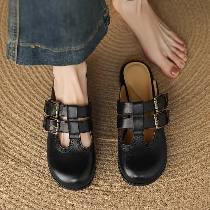 Theodora Mule Heels featuring soft leather material and a comfortable block heel, perfect for stylish and easy wear. - 38