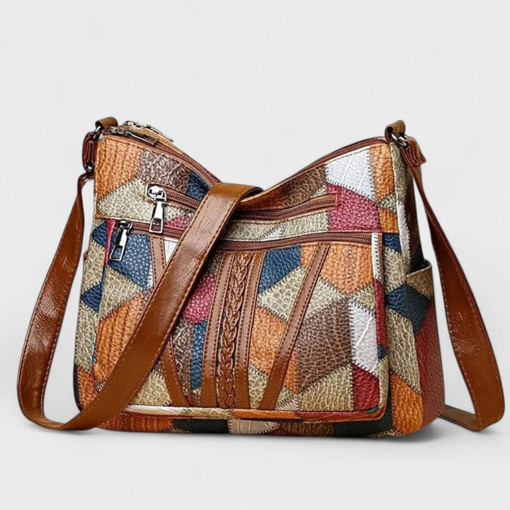 Sola Mosaic Bag featuring an artistic patchwork design with vibrant colors and intricate patterns, perfect for adding a unique touch to any outfit. - 1
