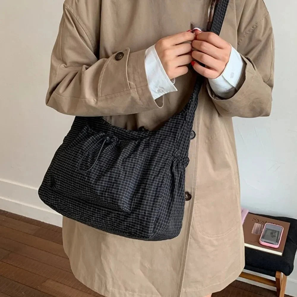 Nava Crossbody Bag for Women featuring a stylish checkered design made of durable nylon and polyester. - 13