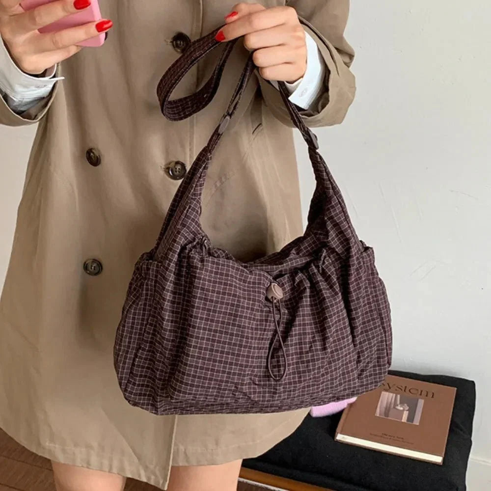 Nava Crossbody Bag for Women featuring a stylish checkered design made of durable nylon and polyester. - 19
