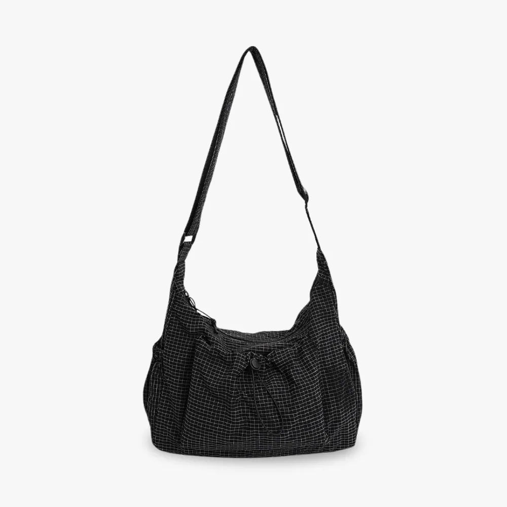 Nava Crossbody Bag for Women featuring a stylish checkered design made of durable nylon and polyester. - 1
