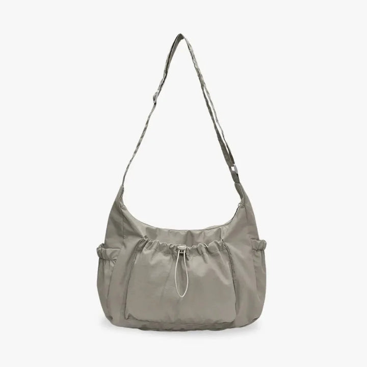 Nava Crossbody Bag for Women featuring a stylish checkered design made of durable nylon and polyester. - 9