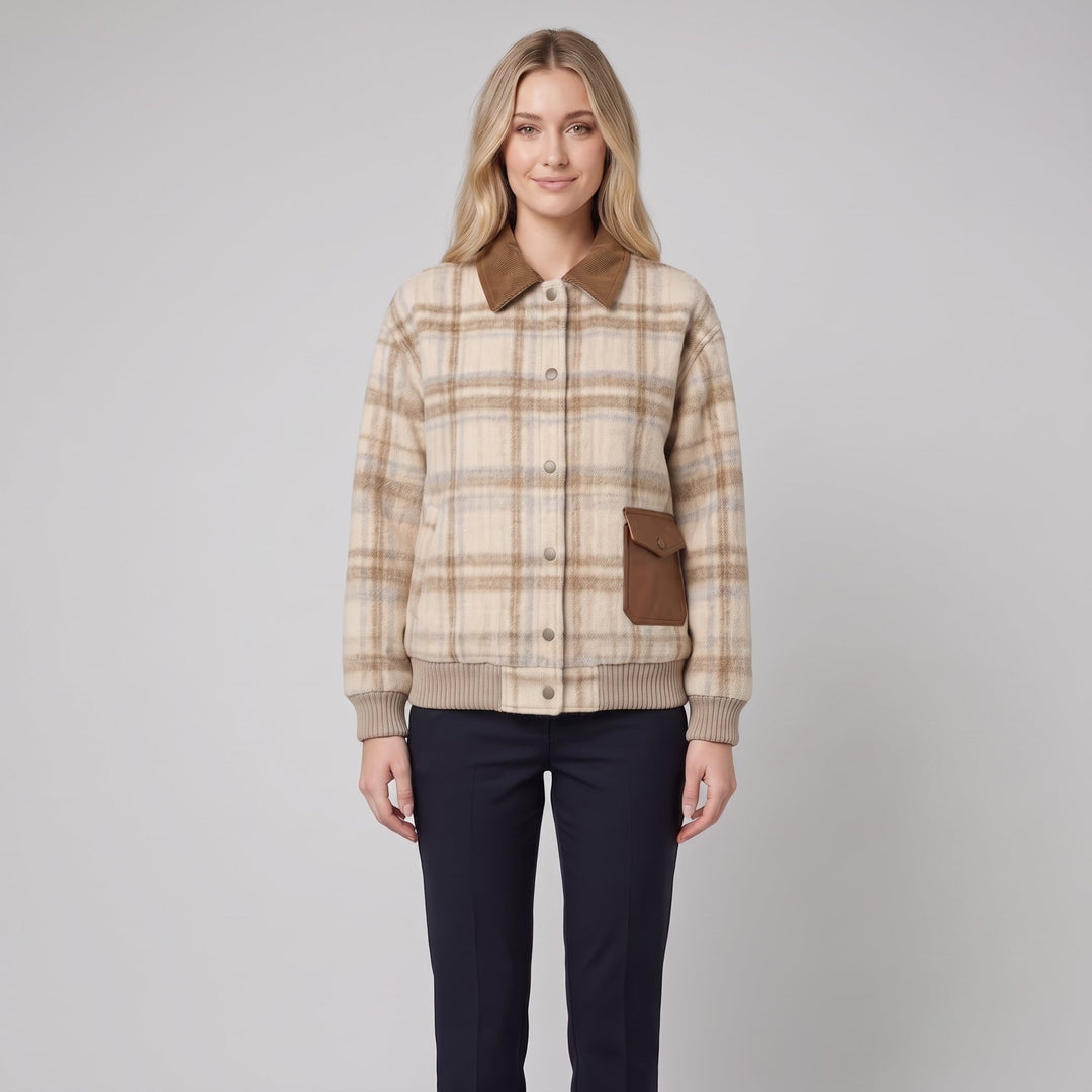Woman wearing a beige checked plaid wool bomber jacket, front view