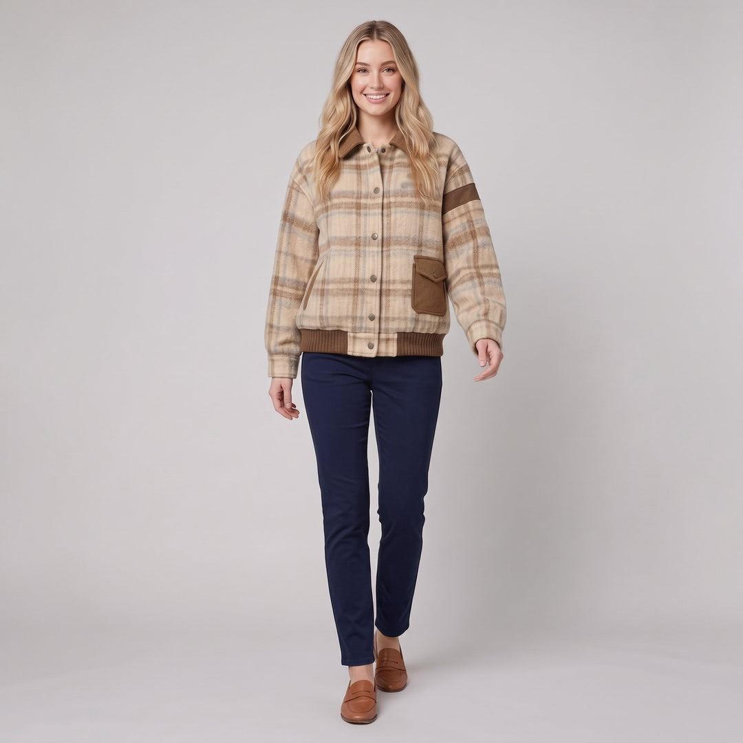 Beige plaid bomber jacket in a relaxed walking pose