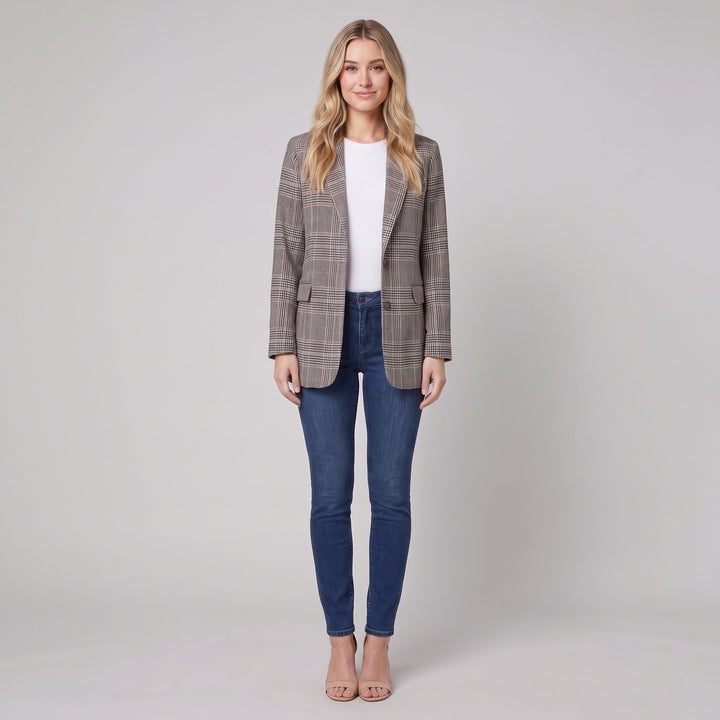 Woman wearing a grey glen-check blazer with brown overcheck, front view