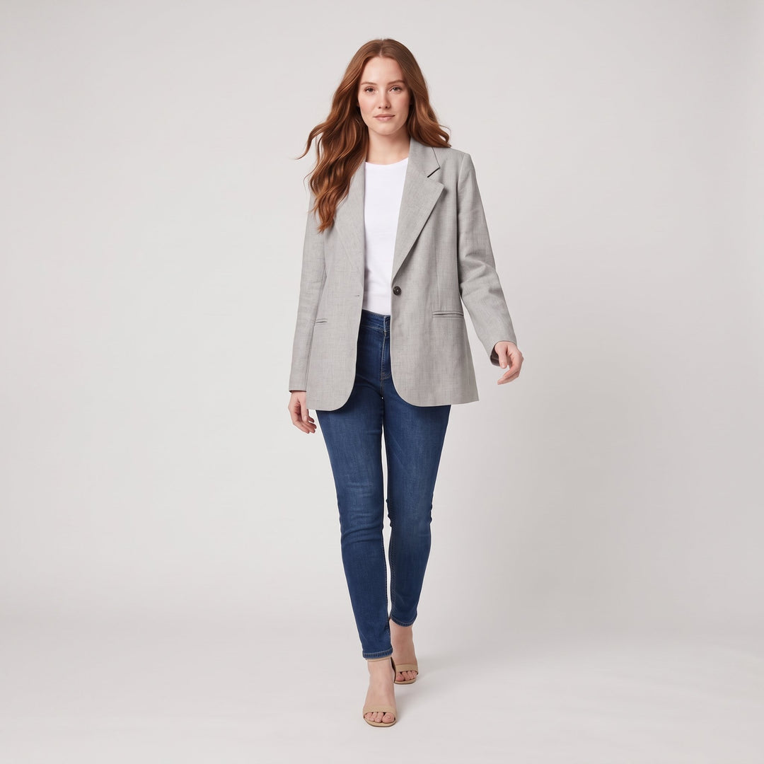 Women's grey tailored blazer walking