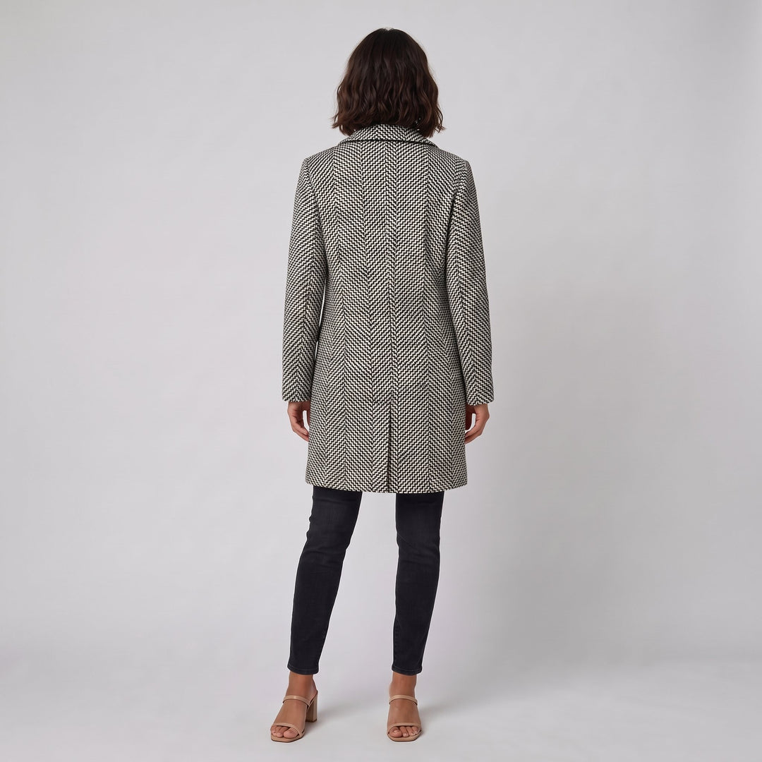 Back view of the black and white herringbone winter coat