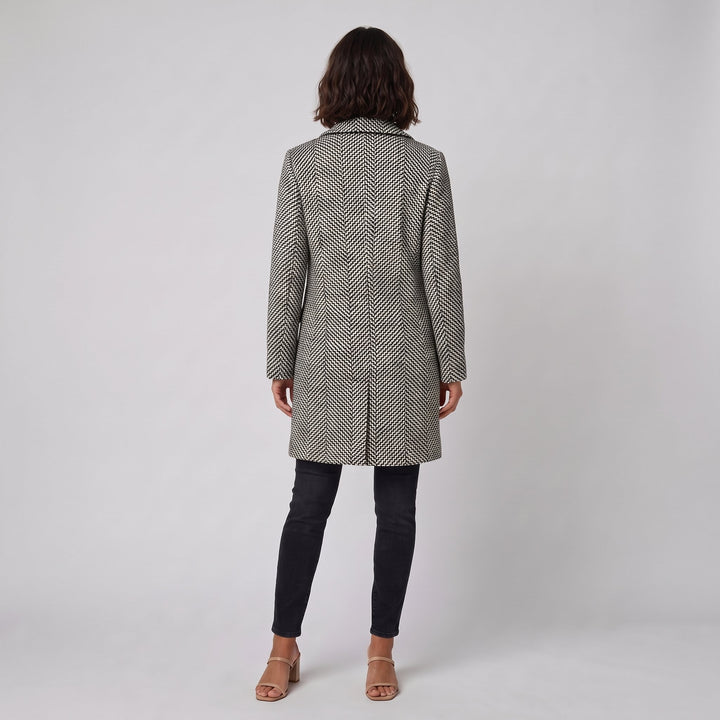 Back view of the black and white herringbone winter coat