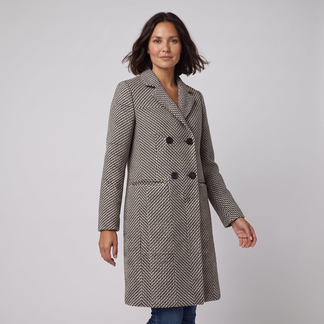 Herringbone coat shown in a relaxed walking pose