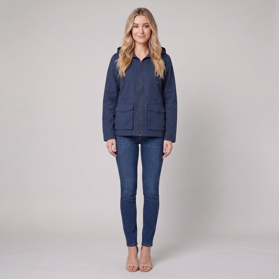 Woman wearing a navy blue canvas hooded field jacket, front view