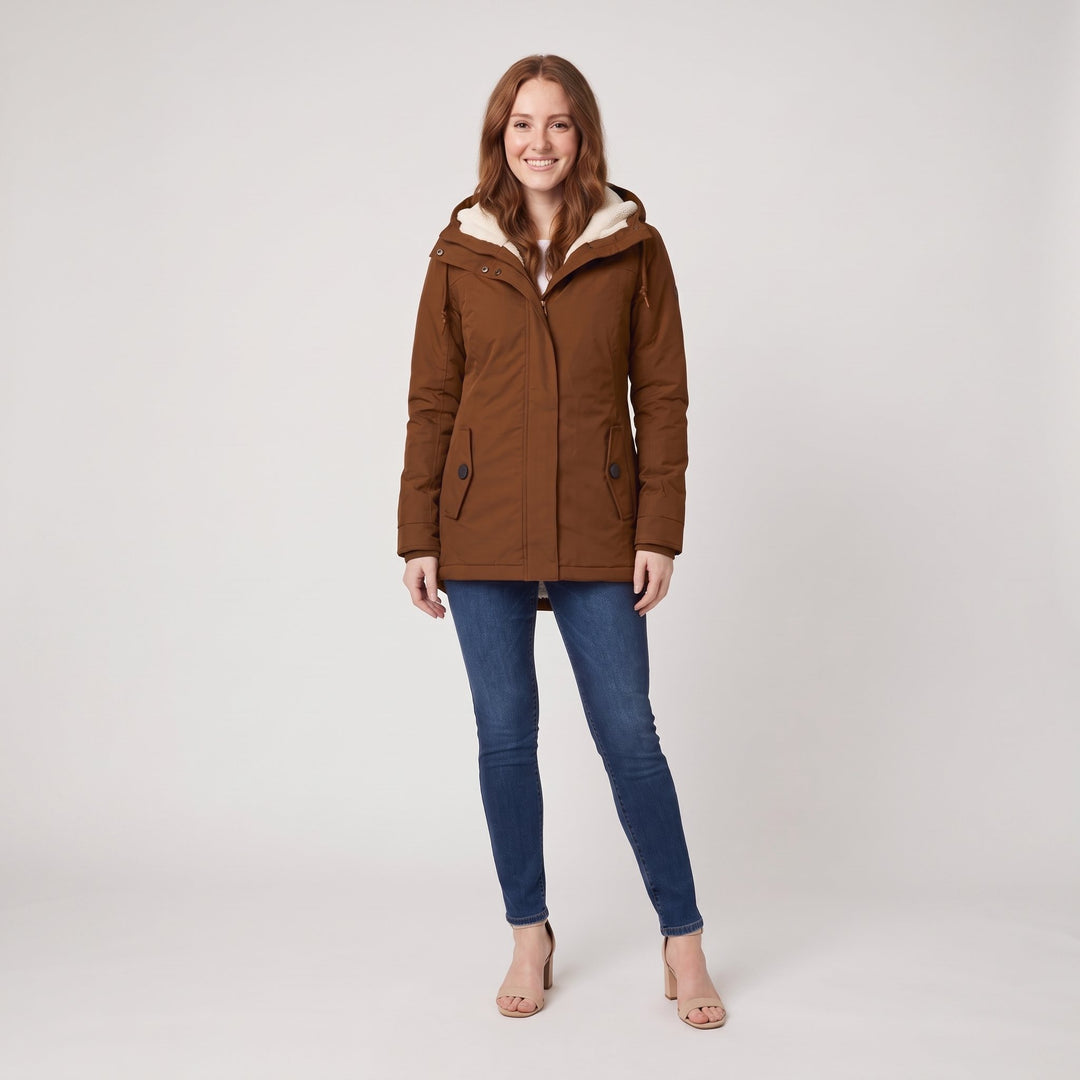 Woman wearing a brown fleece-lined hooded parka, front view