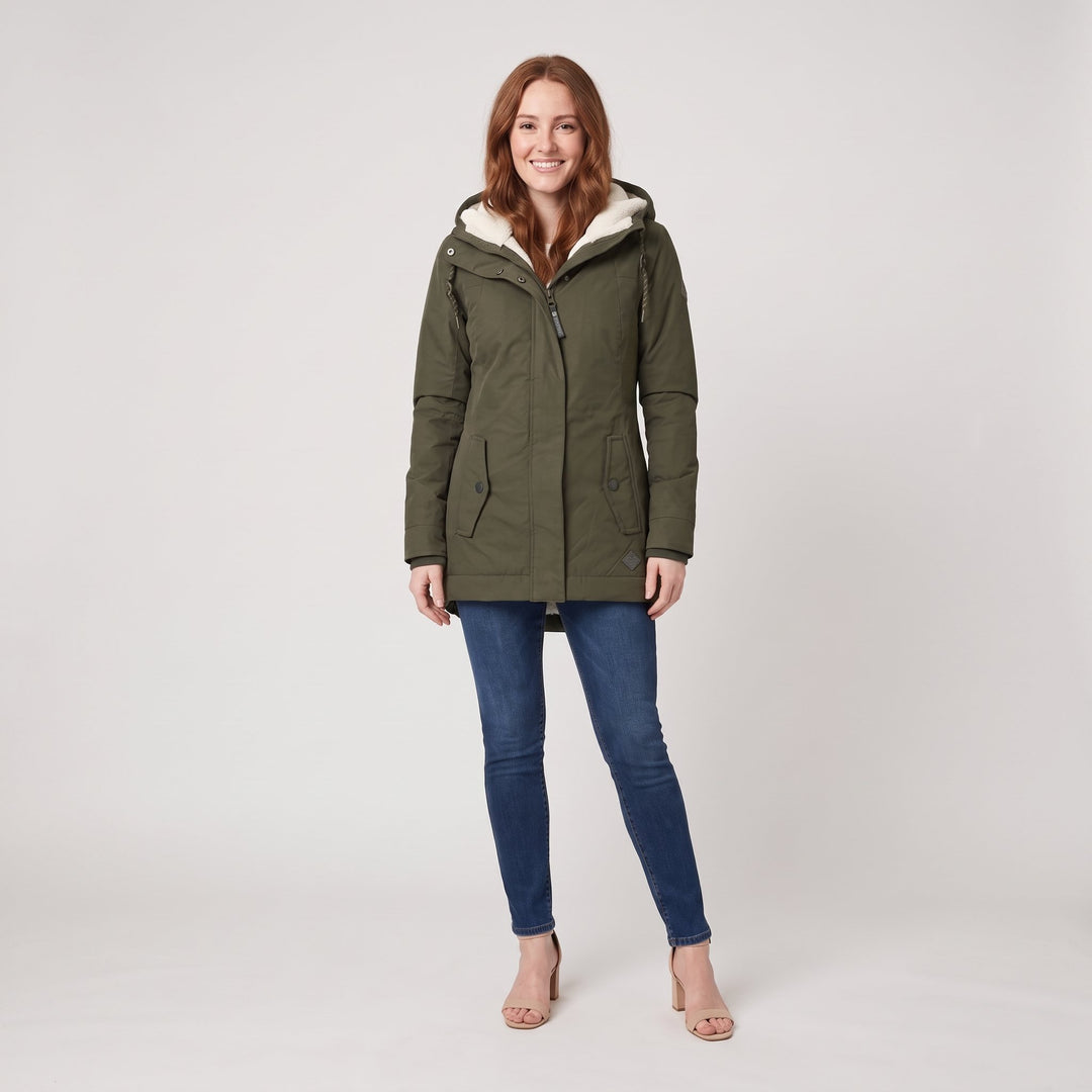 Woman wearing an olive green fleece-lined hooded parka, front view