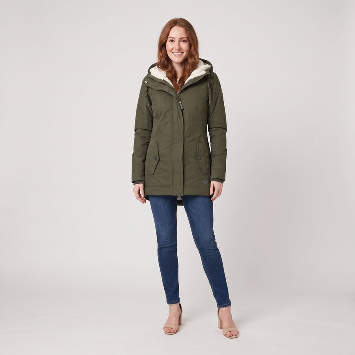 Woman wearing an olive green fleece-lined hooded parka, front view