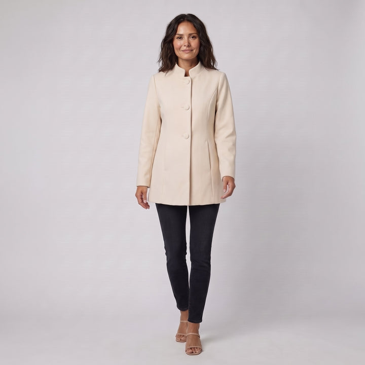 Cream-beige stand-collar jacket in a walking pose