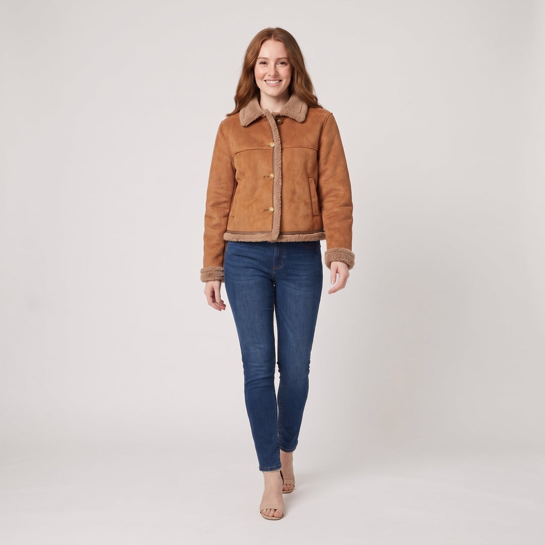 Brown suede shearling jacket in a walking pose