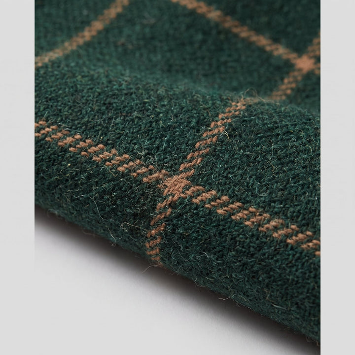 Close-up of the green windowpane check wool fabric