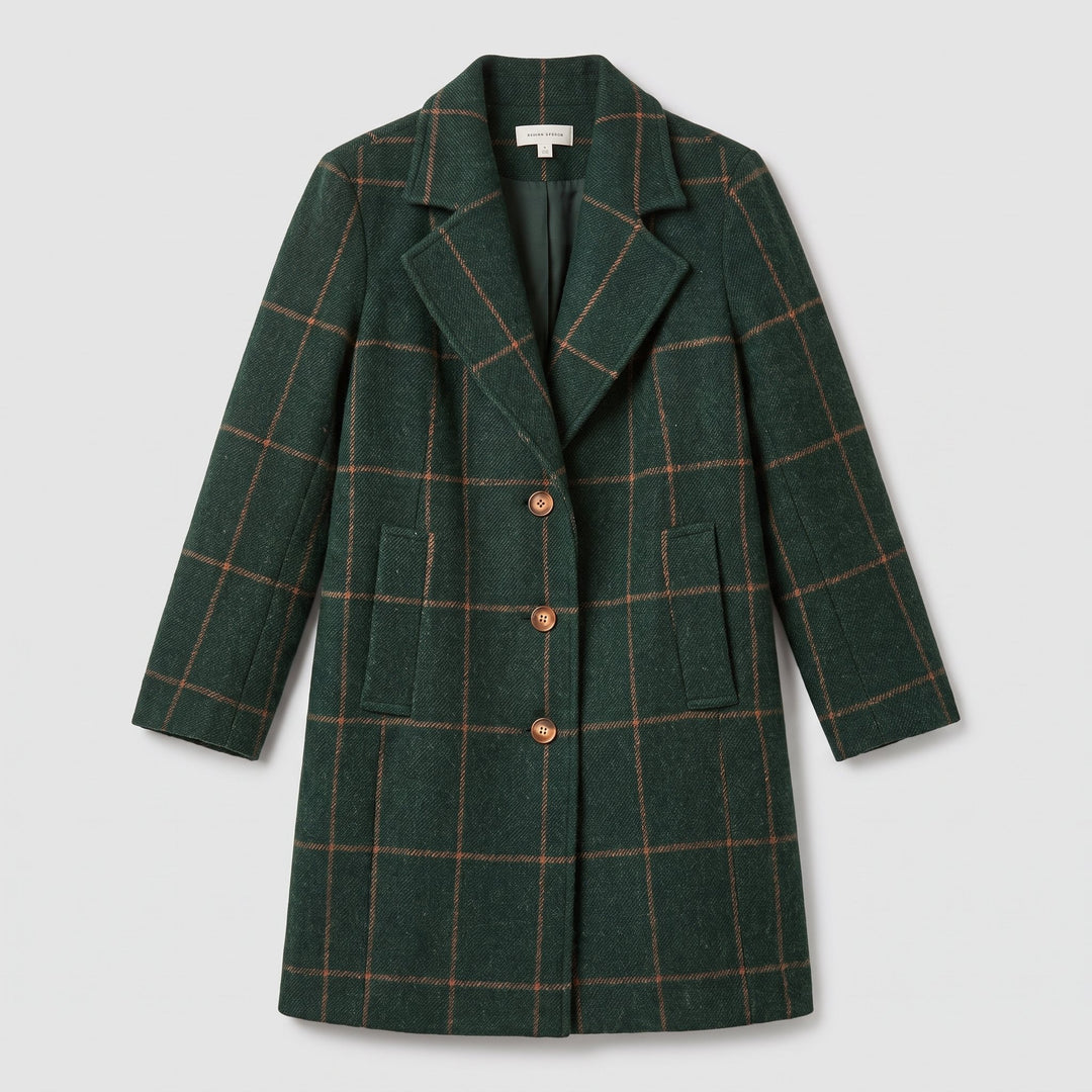 Flat-lay of the green windowpane check wool coat