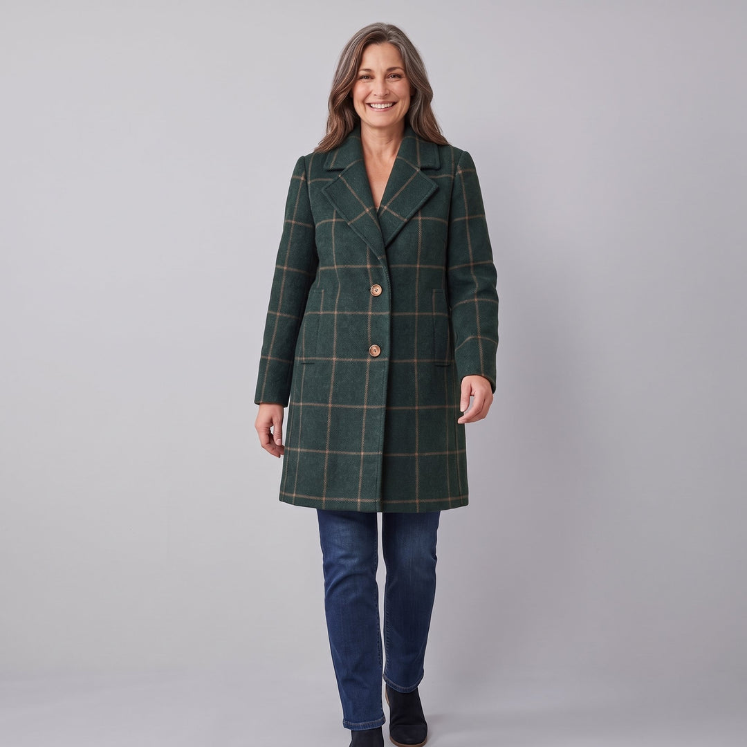 Green windowpane check coat in a walking pose