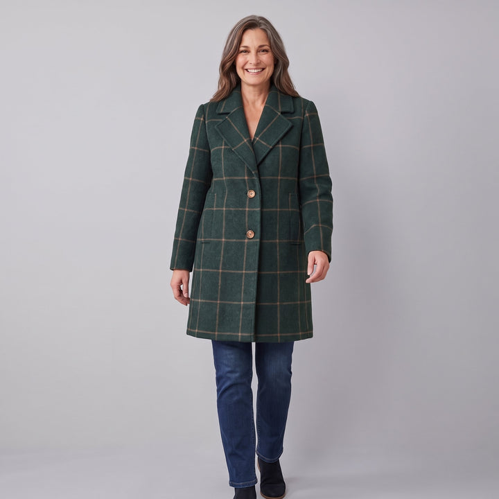 Green windowpane check coat in a walking pose