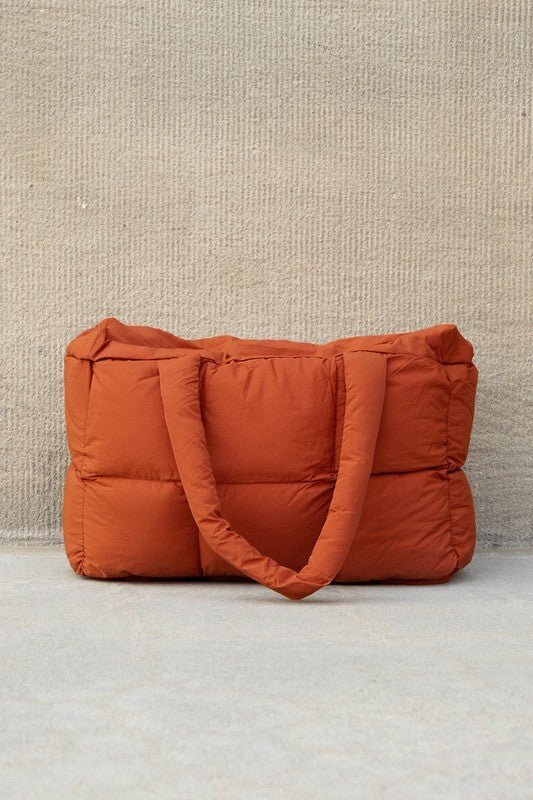 Daphne Puffer Tote featuring a durable polyester and nylon exterior with a stylish cotton lining, perfect for everyday use and trendy outings. - 12