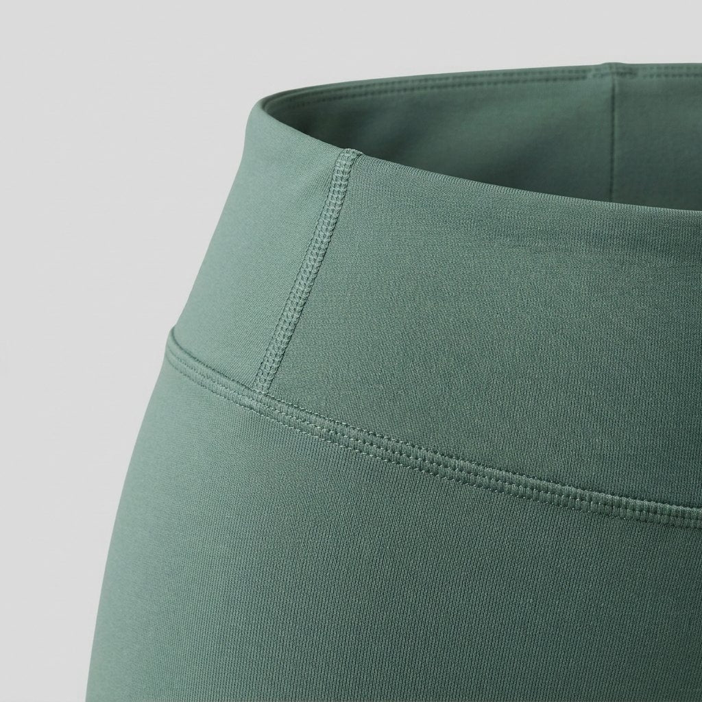 Elysia green leggings compression fabric close-up