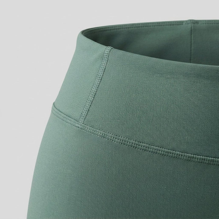 Elysia green leggings compression fabric close-up