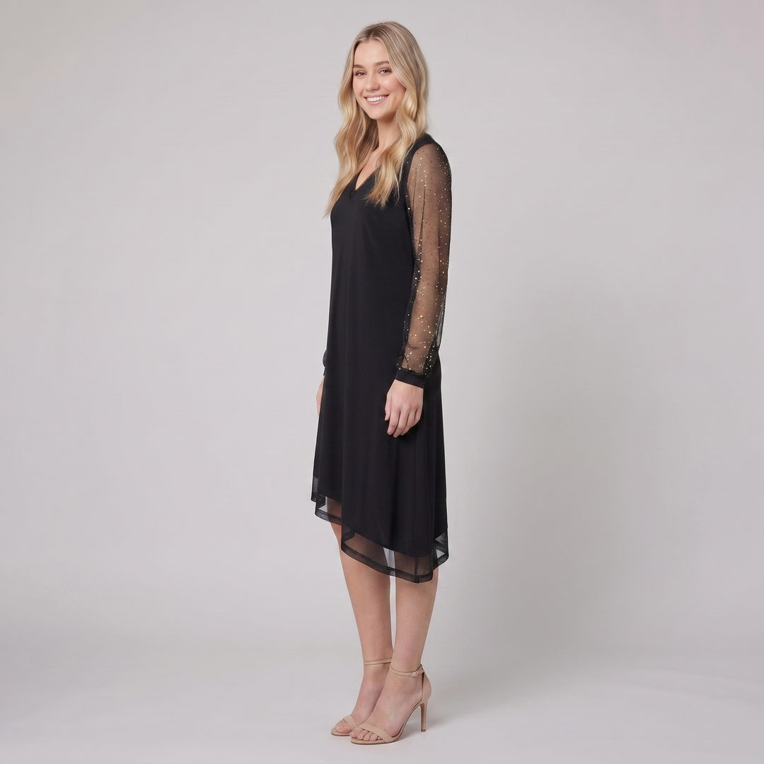 Matilda sheer sleeve evening dress in black, side view on model