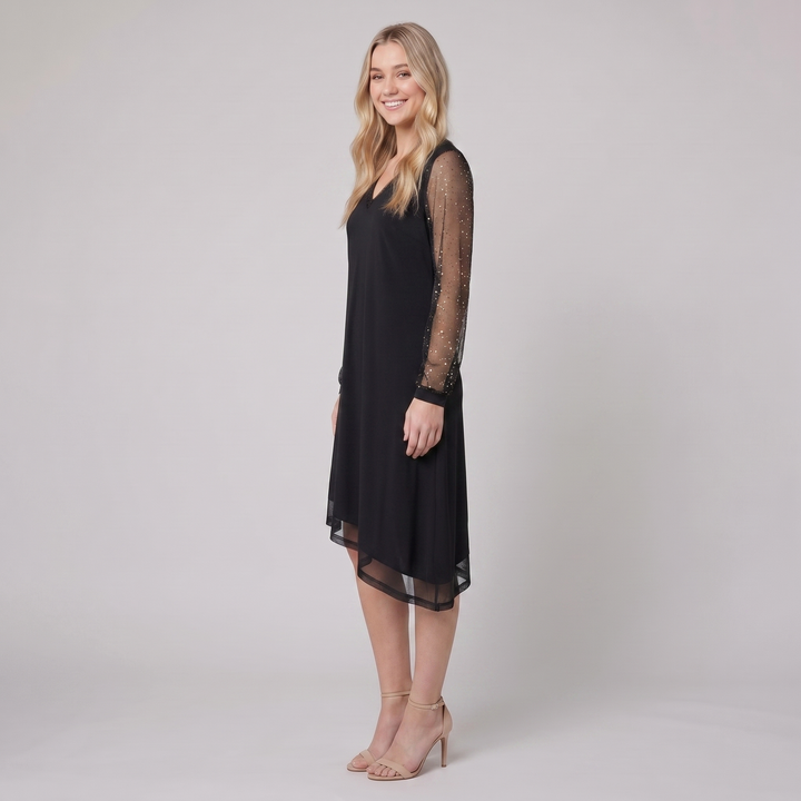 Matilda sheer sleeve evening dress in black, side view on model