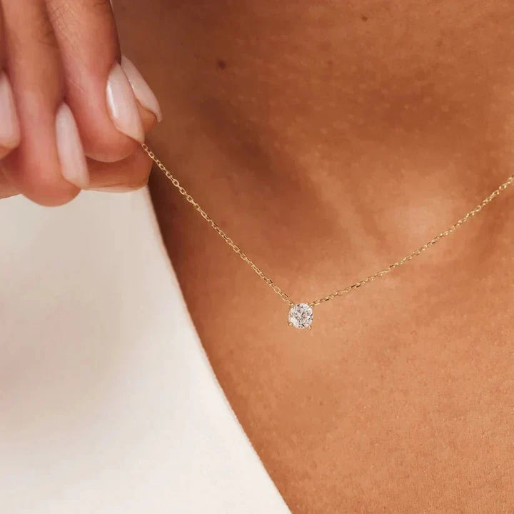 Clea Moissanite Necklace featuring a stunning, sparkling moissanite pendant set in a sleek, elegant design, perfect for adding a touch of timeless - 1