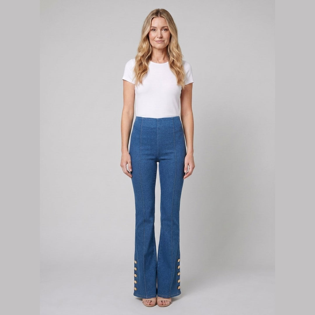 Kendra mid-wash denim flared pants with gold buttons, front