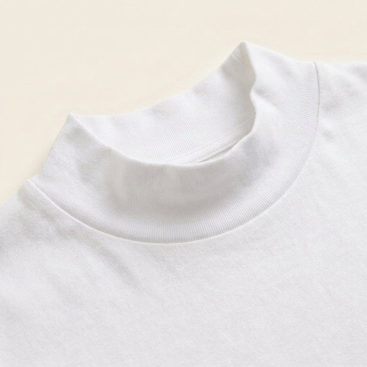 Maverick white brushed cotton mock neck fabric detail