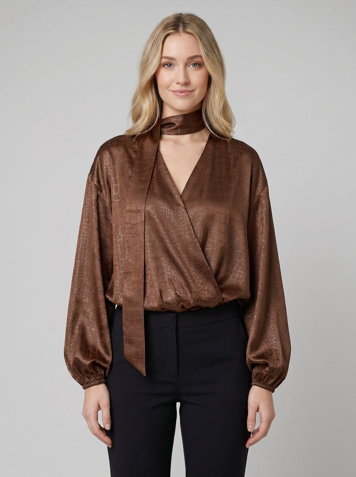 Alexia brown satin tie-neck blouse front on model