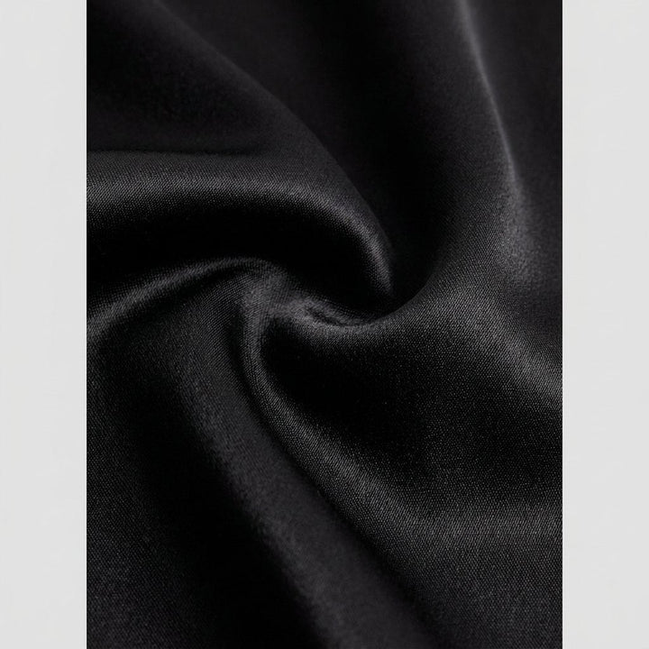Alva black satin fabric close-up