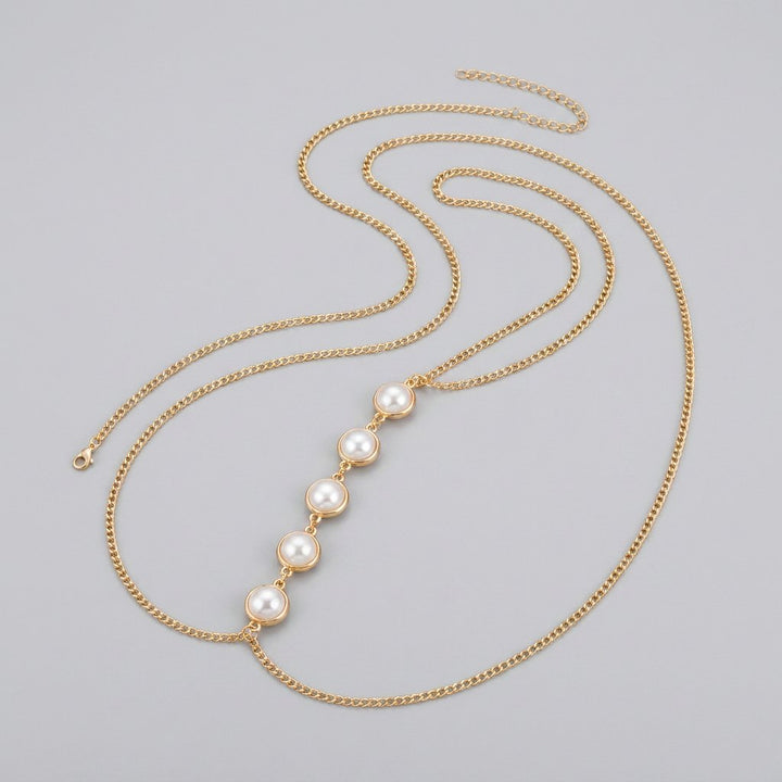 Amber gold pearl body chain draped
