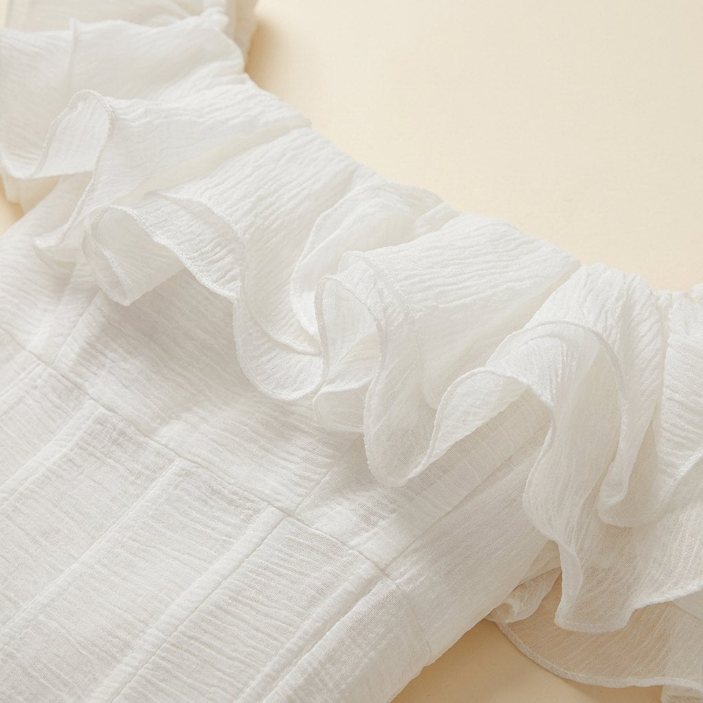 Apolline white crinkle chiffon fabric detail