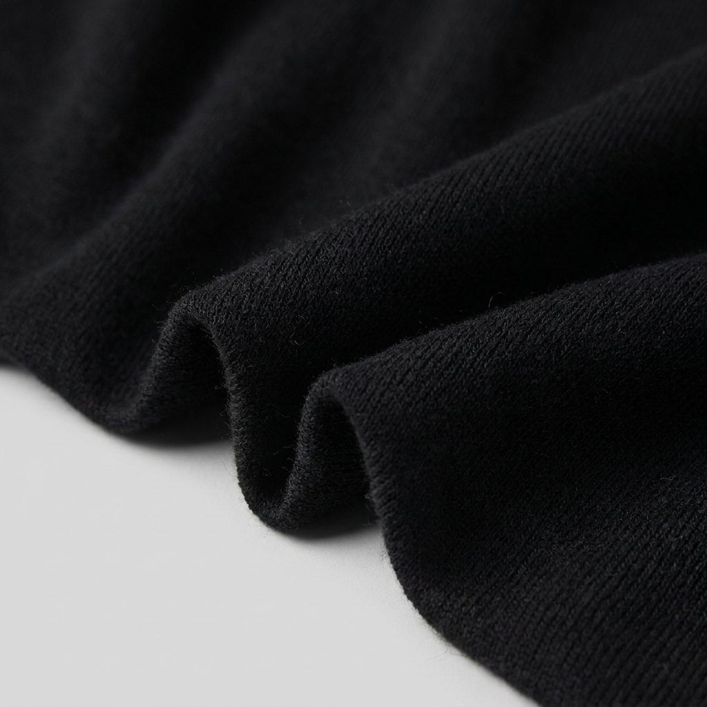Asera black knit fabric close-up