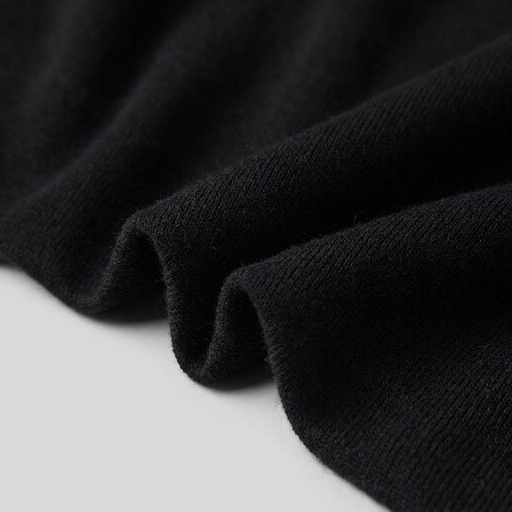 Asera black knit fabric close-up