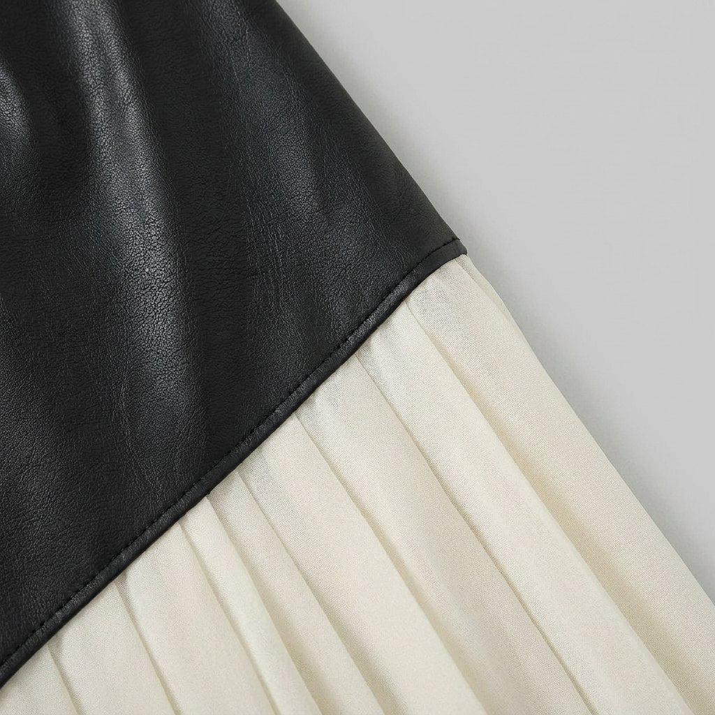 Astra faux-leather and pleated chiffon fabric close-up