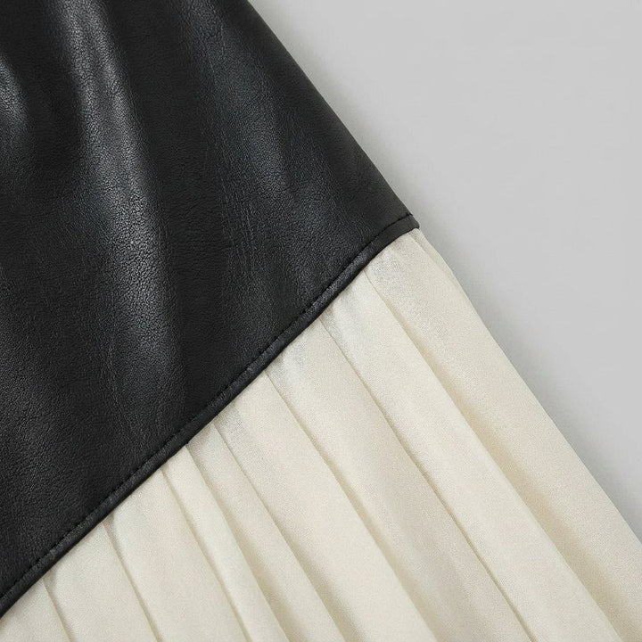 Astra faux-leather and pleated chiffon fabric close-up