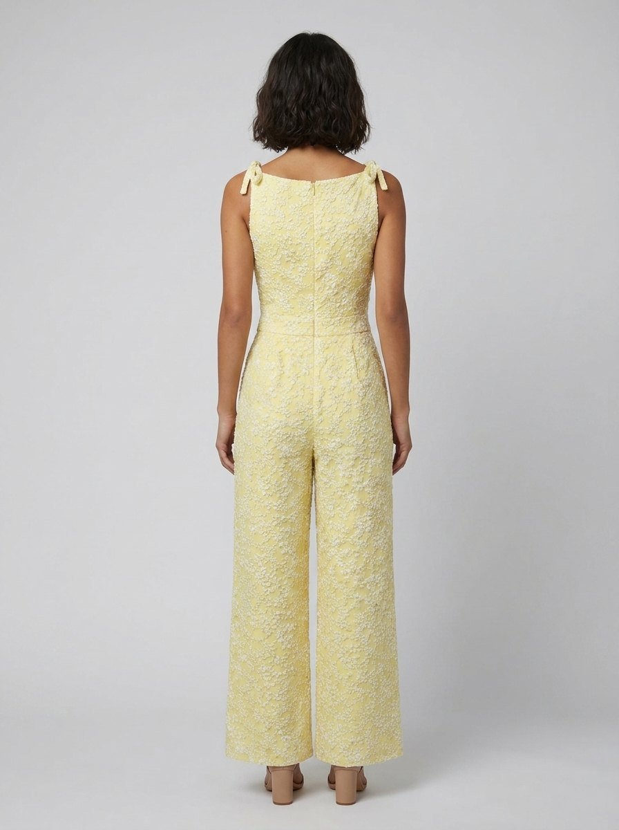 Yellow sleeveless jumpsuit, back view on model