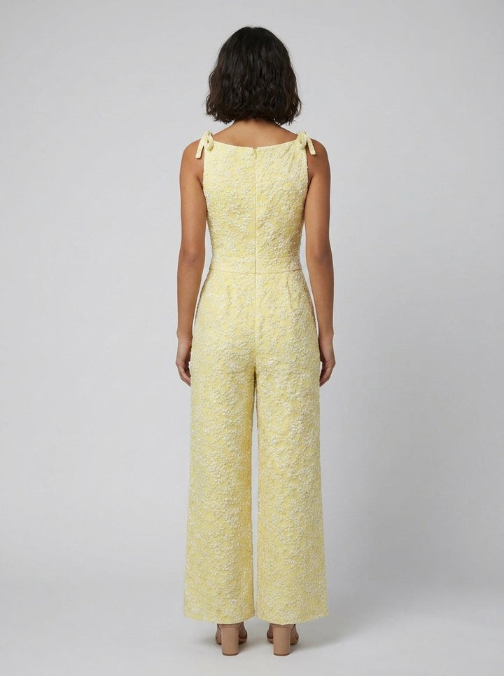 Yellow sleeveless jumpsuit, back view on model