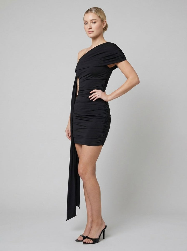 Bree black dress side pose
