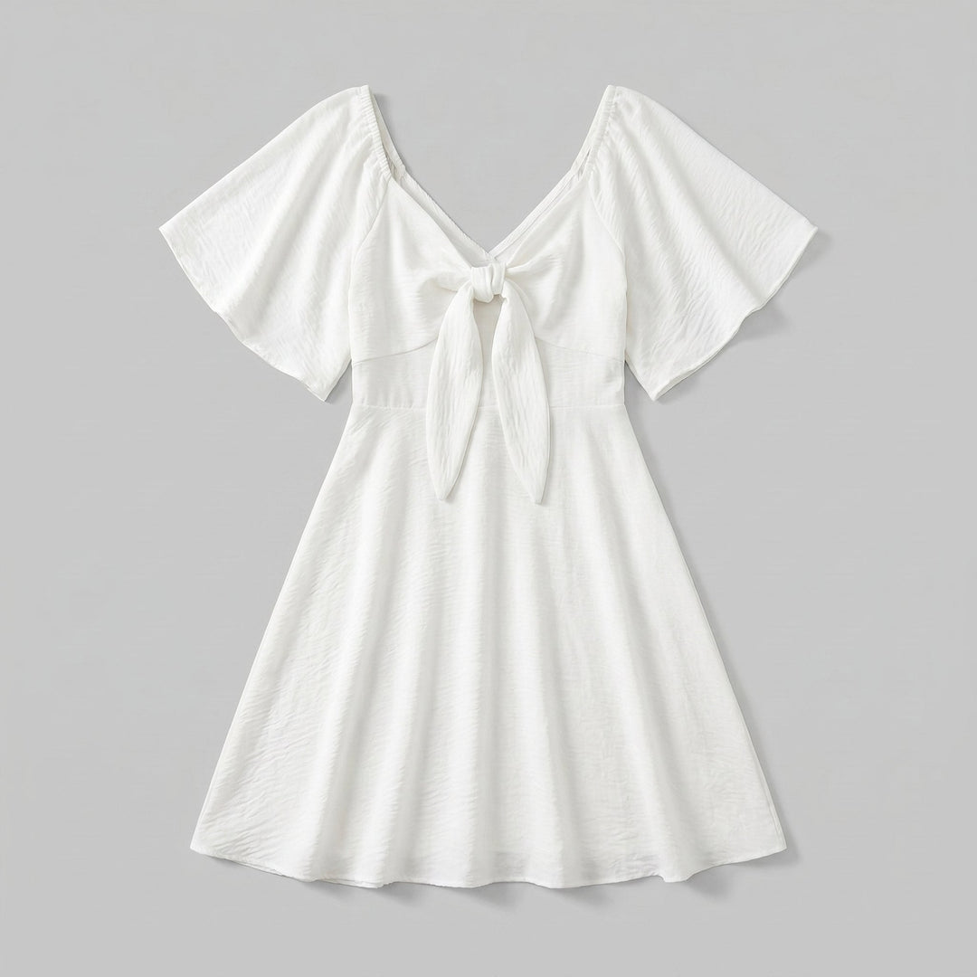 Charline mini dress in white, flat lay