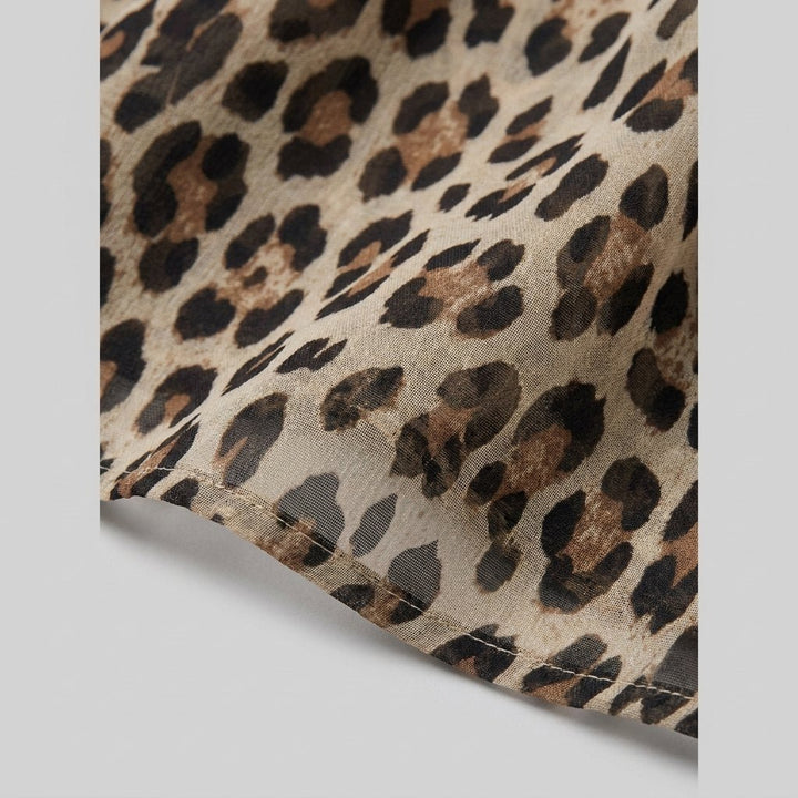 Chiffon leopard print sheer fabric close-up detail