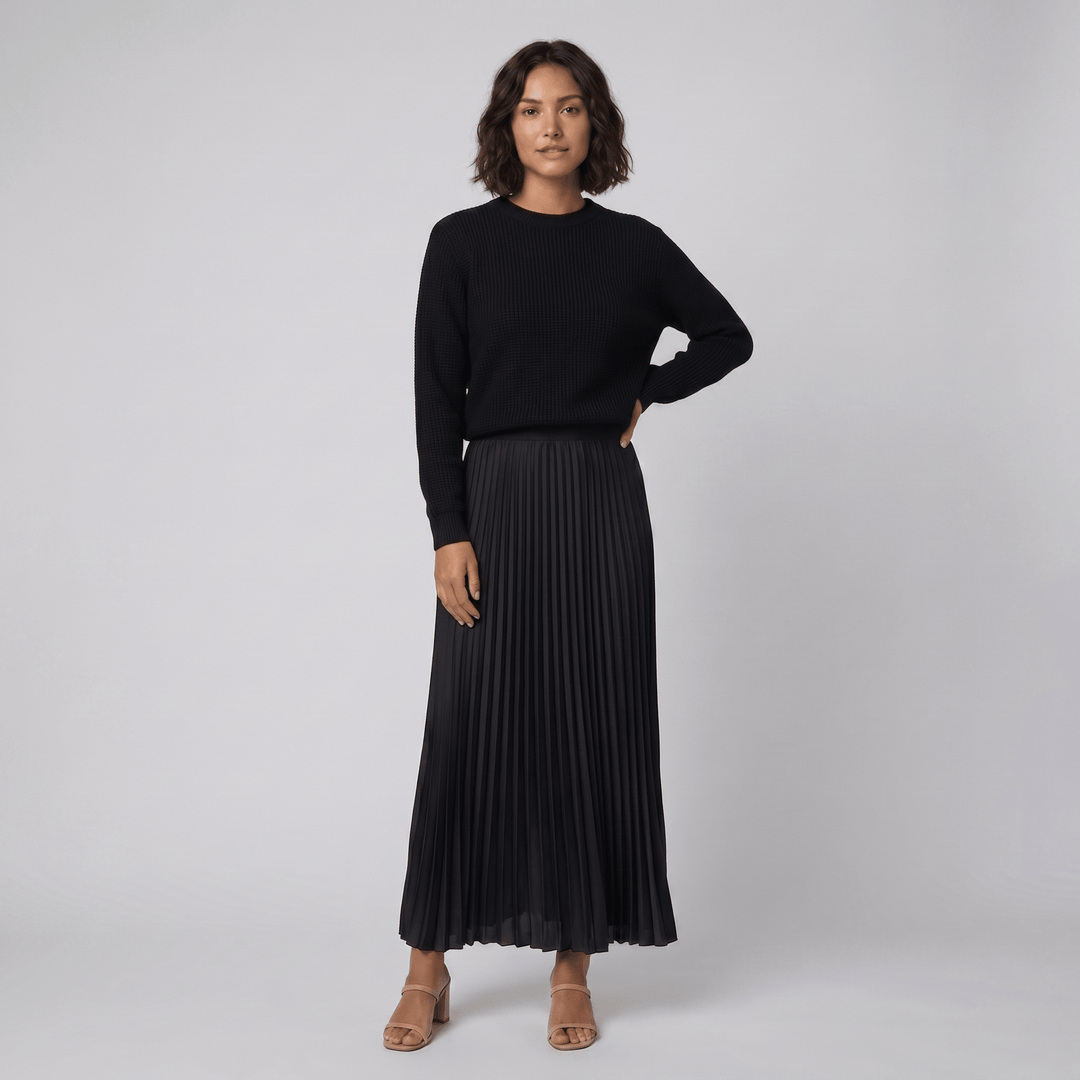 Clara black knit pullover and pleated skirt set