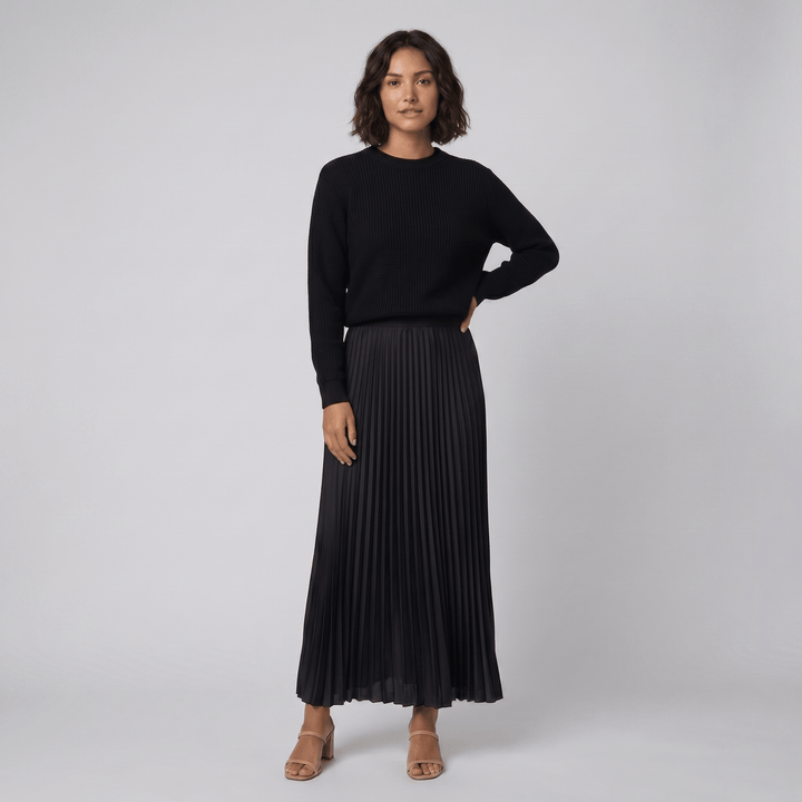 Clara black knit pullover and pleated skirt set