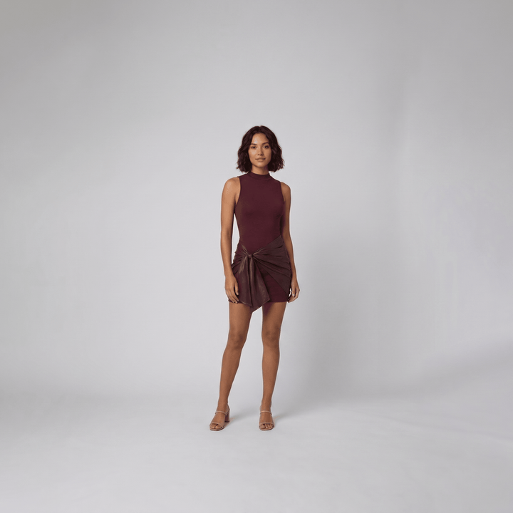 Colette burgundy mock neck mini dress with faux leather wrap